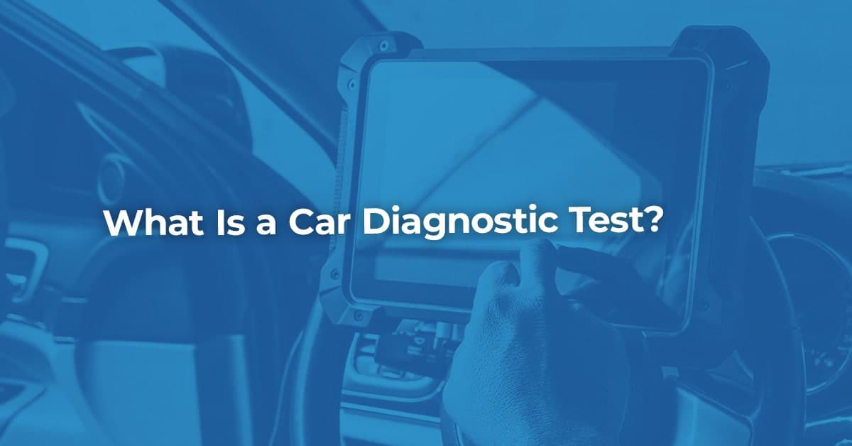 The article title over someone carrying out a diagnostic test on a car.