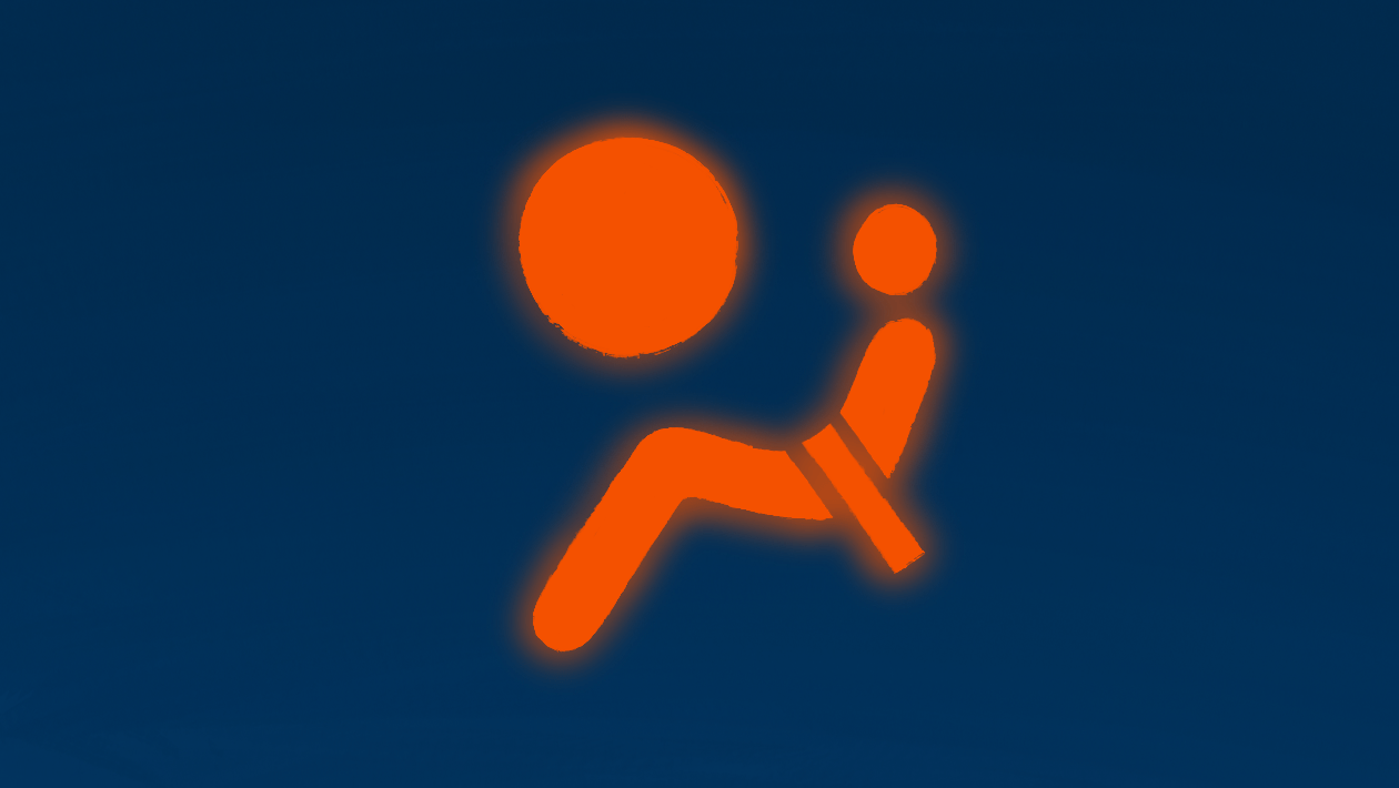 The airbag warning light on a car dashboard. 
